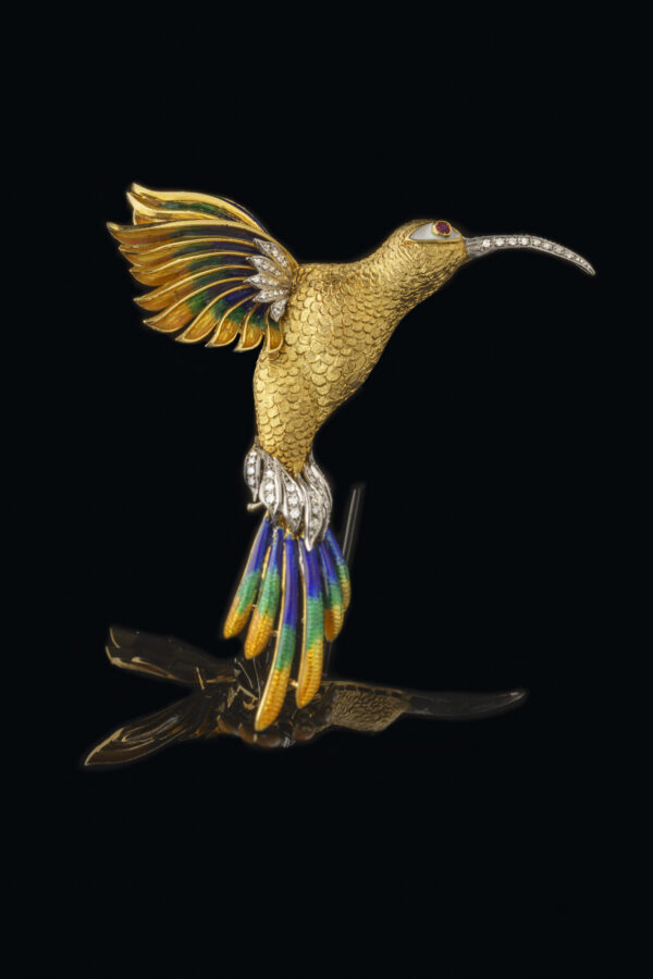 Gold polychrome-enameled brooch shaped as a hummingbird set with diamonds